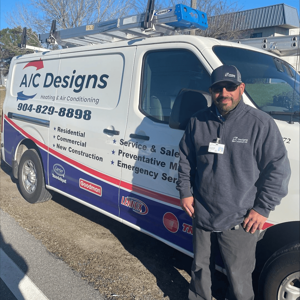 Daniel in front of an AC Designs van